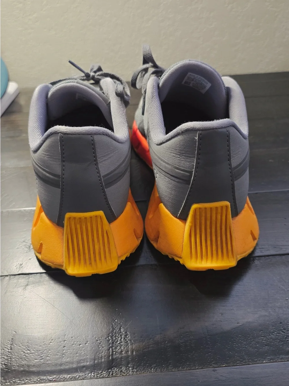 Reebok Grey Mesh Sneakers with Orange-Yellow Gradient Sole